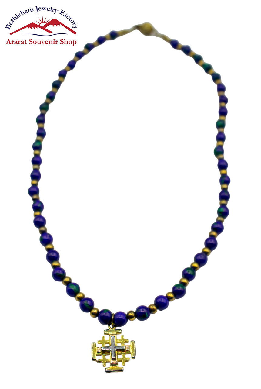A blue and gold beaded Malachite necklace with a gold cross.